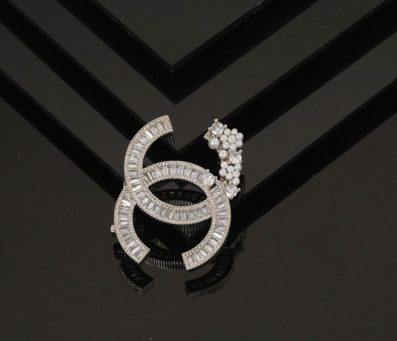 Ch**el brooches